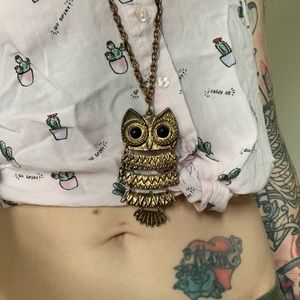 Hinged Owl Necklace with long chain.